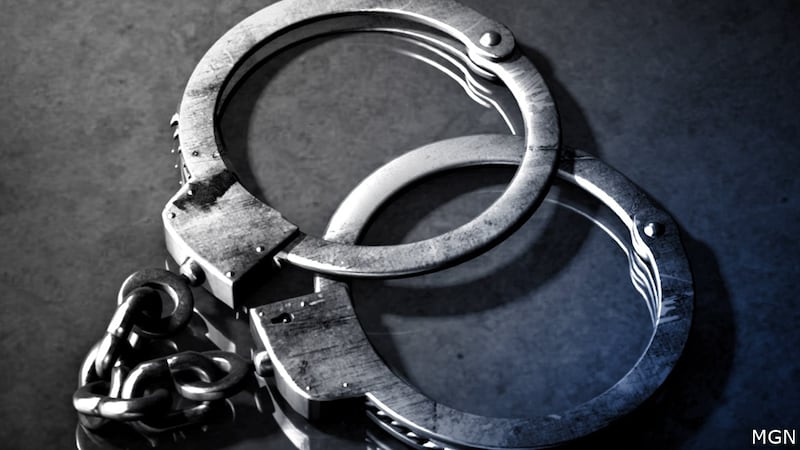 FILE - A man is in custody after police say he and another man raped a college student in...