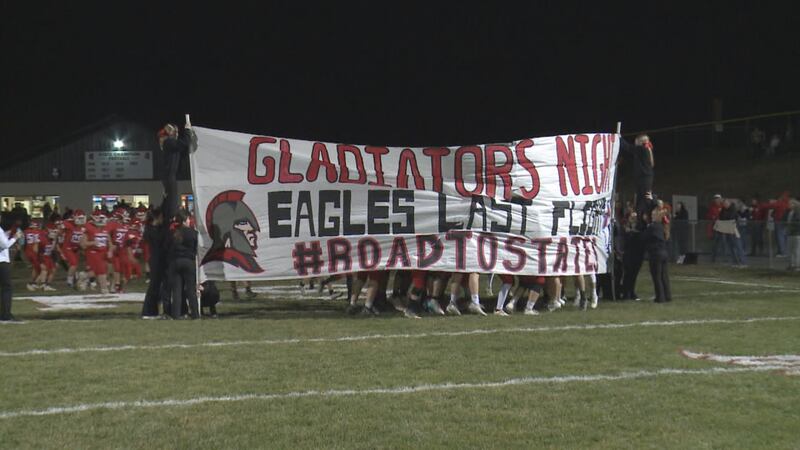 The Riverheads Gladiators take the field before their Region 2B semifinal matchup against...
