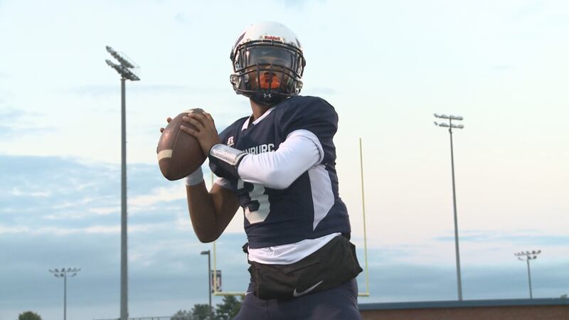Harrisonburg quarterback J.J. Engle during pregame warmups against Amherst on Sept. 29, 2023