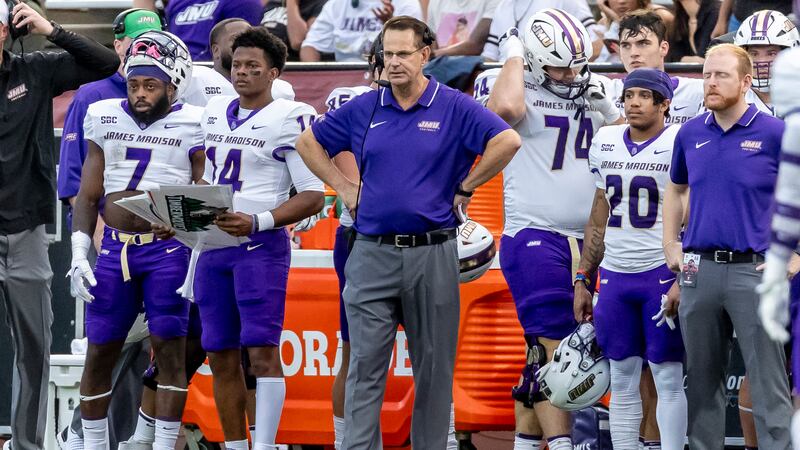 James Madison coach Curt Cignetti watches play during the first half of the team's NCAA...