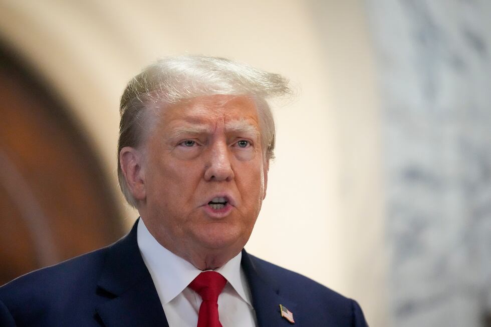 Former President Donald Trump speaks to the media before entering the courtroom at New York...