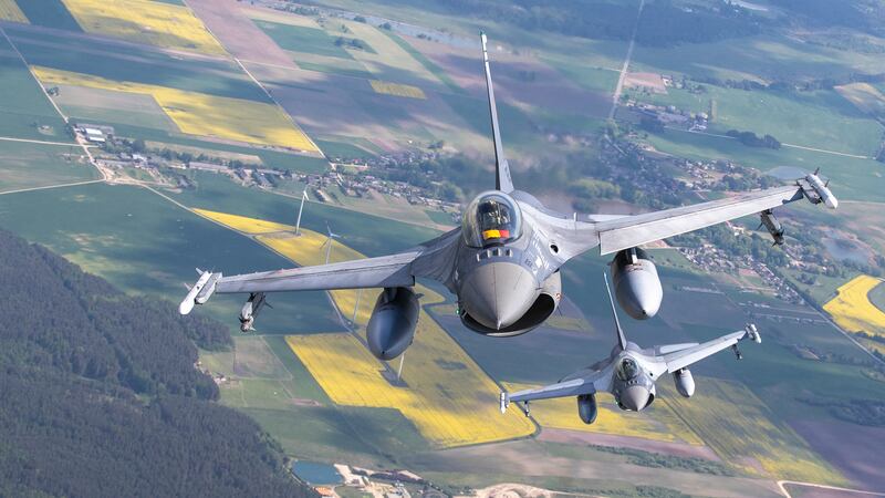 Romanian Air Force F- 16s military fighter jets participating in NATO's Baltic Air Policing...