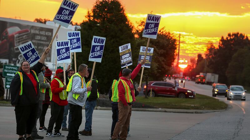 File - UAW local 862 members strike outside of Ford's Kentucky Truck Plant in Louisville, Ky....