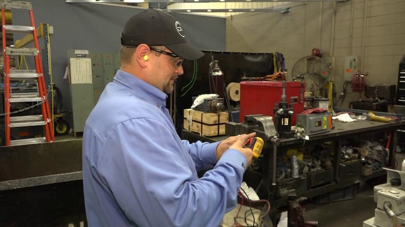 Jonathan Kisamore working at the Tenneco plant in Harrisonburg | Credit: WHSV