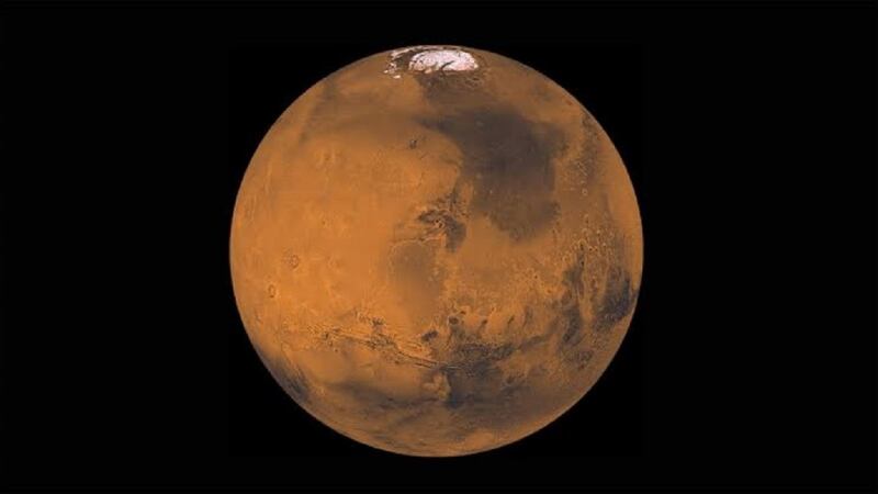Friday night, you can view the moon and Mars together in a single pair of binoculars.