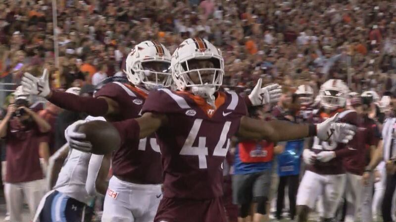 Virginia Tech linebacker Dorian Strong celebrates after an interception against Old Dominion...