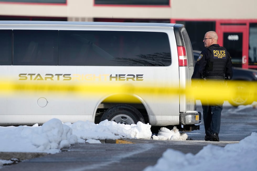 A law enforcement officer walks outside the Starts Right Here building, Monday, Jan. 23, 2023,...