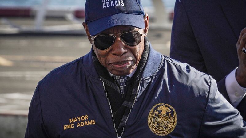 New York City Mayor Eric Adams leaves a news conference at Manhattan's downtown heliport,...