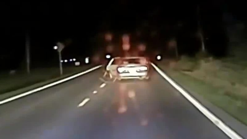 Dash camera footage of pursuit shows suspects throwing items out windows